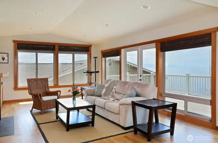 Living room with french doors leading to the viewing deck. Living room with french doors leading to the viewing deck.