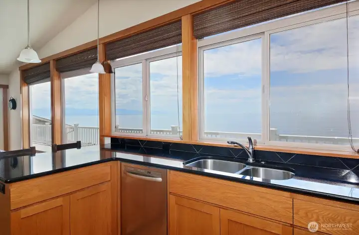 This view from the kitchen, a dishwasher and a double sink make doing the dishes pretty great. This view from the kitchen, a dishwasher and a double sink make doing the dishes pretty great.