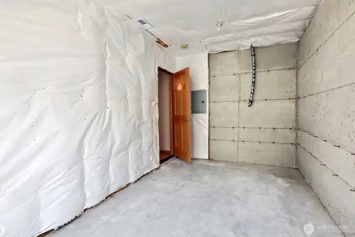 Unfinished space on the lower level has lots of potential. There is a window to the photographer's back. Guest room, office, you decide! Unfinished space on the lower level has lots of potential. There is a window to the photographer's back. Guest room, office, you decide!