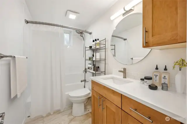 This bathroom is light and bright.