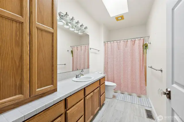 Main full bath w/tons of storage