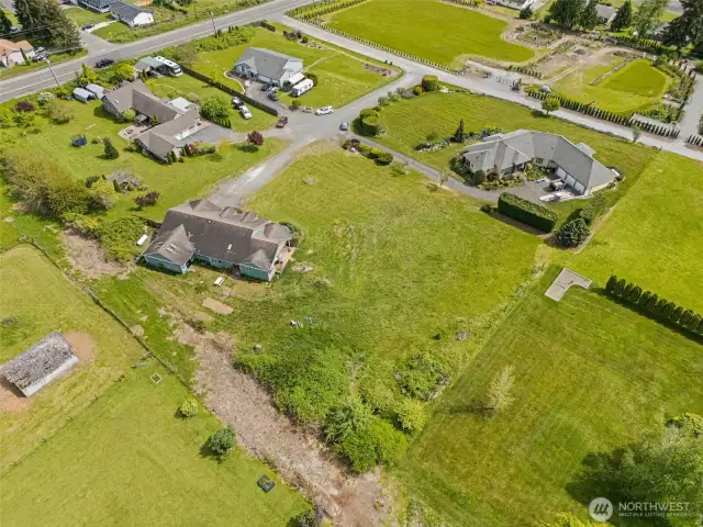 Large lot with mature landscaping and fruit trees