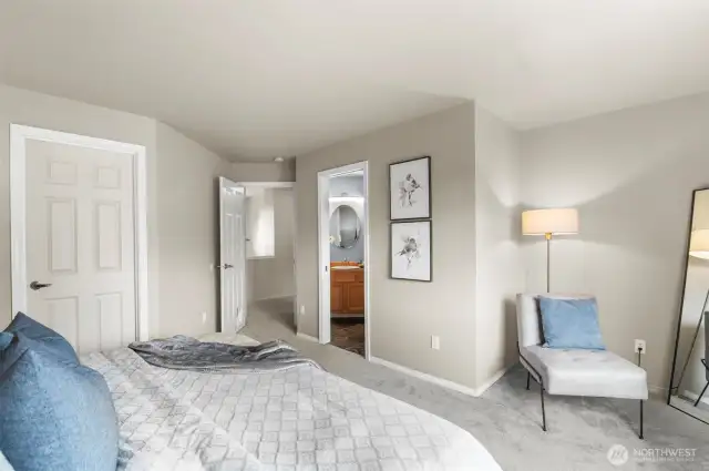Primary bedroom was sitting area, walk-in closet and en-suite 3/4 bath