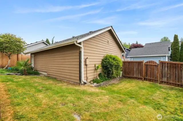 Mature landscaping and fully fenced backyard