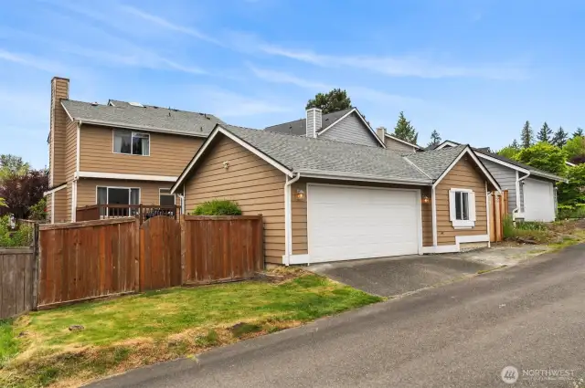 Detached two-car, garage off alleyway plus additional parking choices.