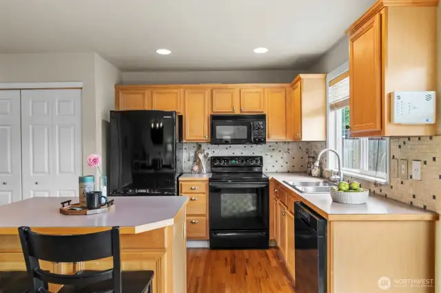 Kitchen with eating space and island with extra storage