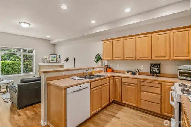 Nice quality cabinets and hardwood floors in this area.
