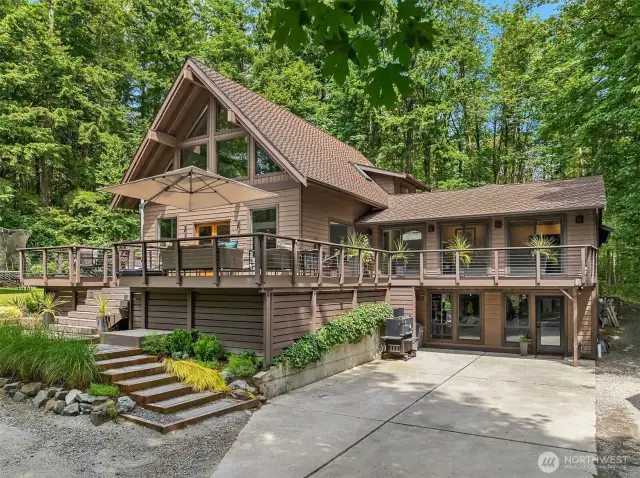 Extraordinary 4,098 sq. ft. multi-level home nestled on 2.5 private acres with high-end upgrades.