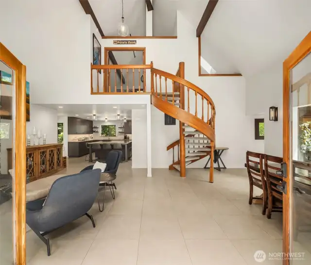 A unique spiral staircase in the great room leads to a bonus room and separate access to a back patio.