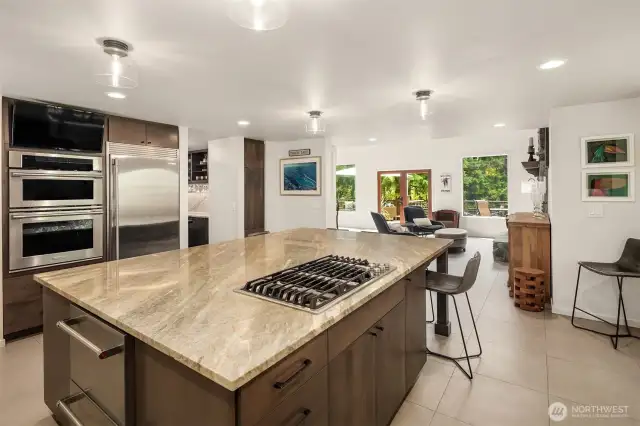 New stainless appliances and a gas cooktop on the island add to the appeal of this kitchen.