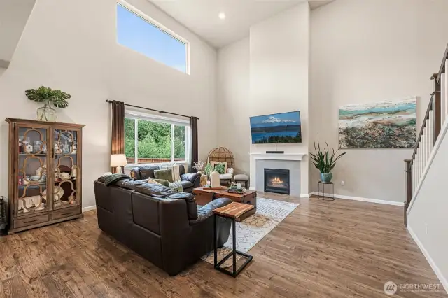 Open concept floor plan w/soaring ceilings & large windows for natural light.