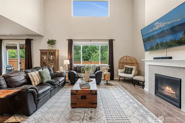 Extensive LVP flooring w/cozy gas fireplace.