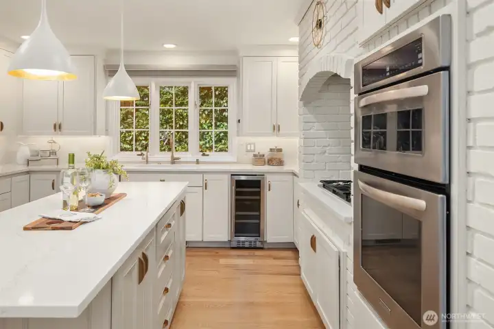 Double ovens, gas cooktop, and custom cabinetry for the serious cook