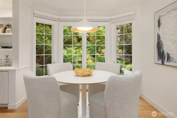 Casual dining space with serene garden views