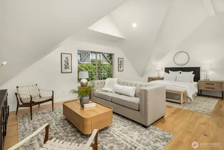 Open ADU living area with space for lounging, dining, and sleeping