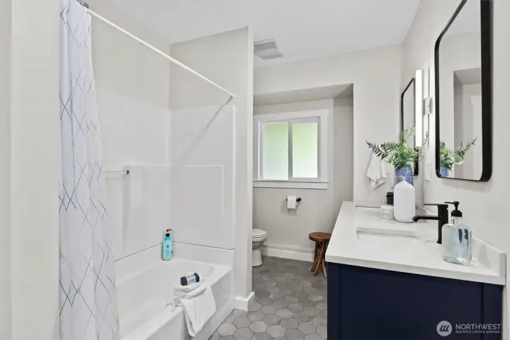 Another full bath with two sinks!