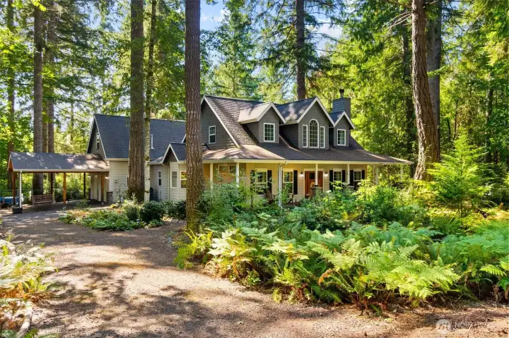 2 Car Attached Carport on the left