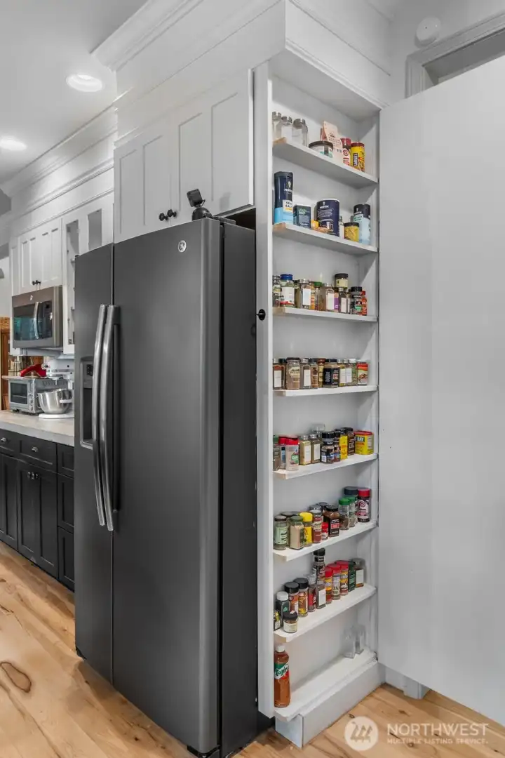 Secret Spice Rack! Pantry in the walk way Secret Spice Rack! Pantry in the walk way