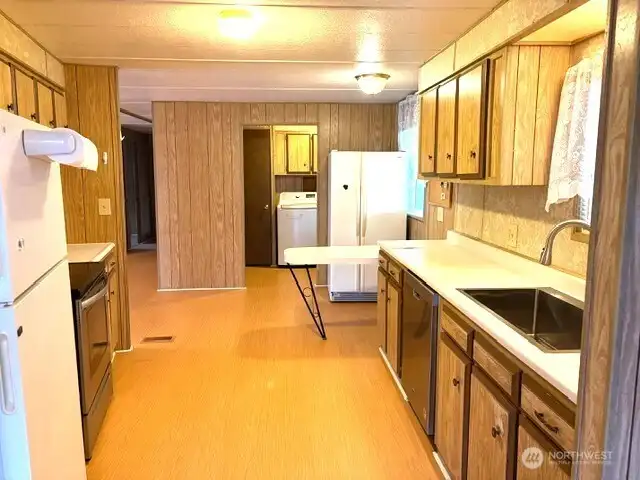 View of kitchen towards laundry room