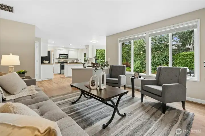 Angle looking back towards the kitchen and showing off the family room hardwood floors.