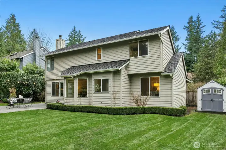 Side yard includes a shed for all of your garden supplies.