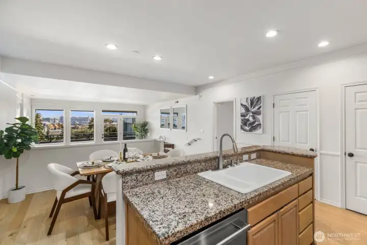 Mirrors in living room invite the Seattle skyline in.