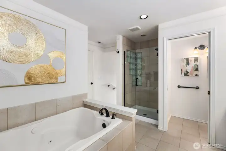 Separate shower Jetted spa tub.