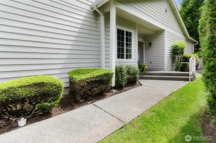 Tidy path to home's main entrance.