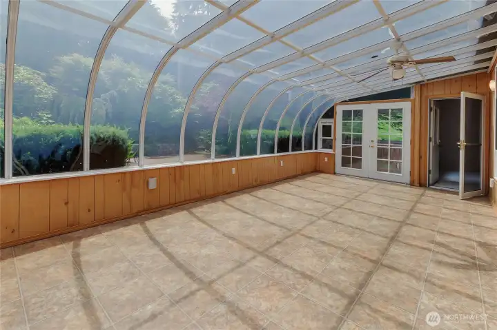 240 sf sunroom provides natural light on even the cloudiest of days.