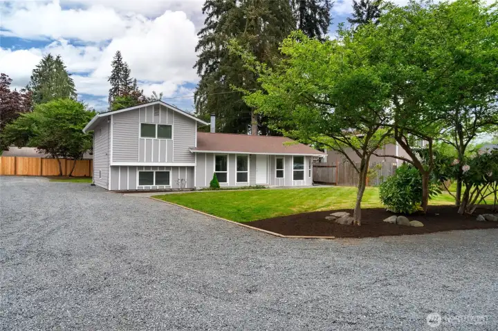 Freshly Painted Tri-Level Home! Nice front yard, tons of parking for vehicles, RV, Boat and Guests!