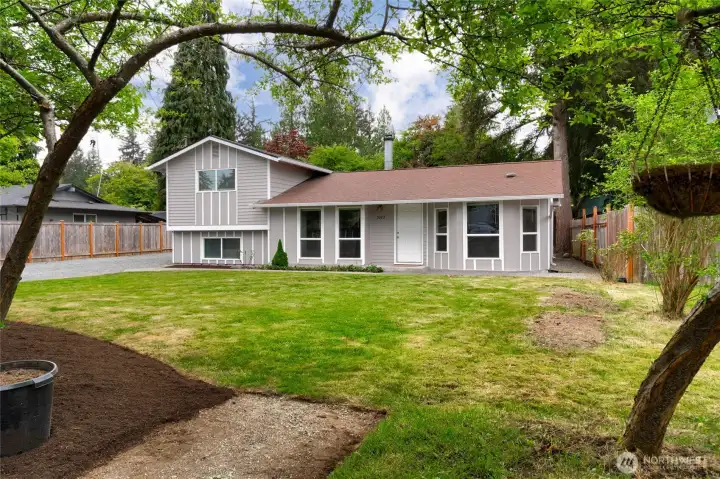 Partially fenced and ready for you to add your favorite plants for Summer!