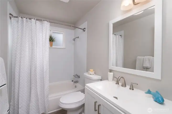 Full bath upstairs next to the Primary Bedroom and Guest Bedroom.