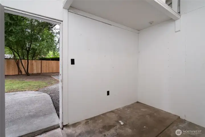 Inside of storage room on back of home.