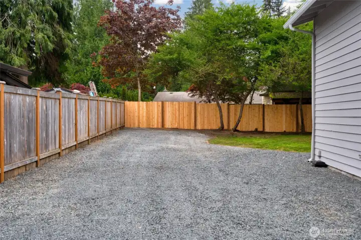 Parking area, possibly add a carport.