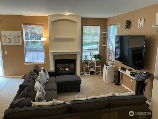 June 5 living room photo with has fireplace