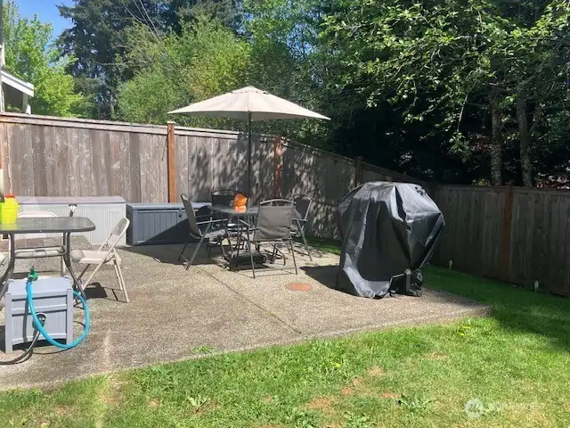 Walk out slider to fenced  & secluded back yard with patio!