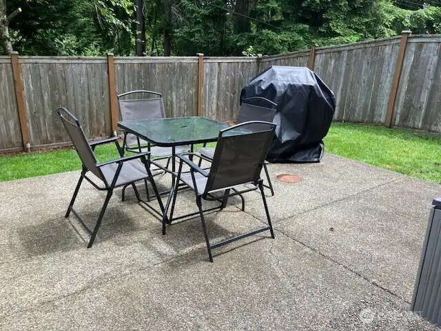 Walk out slider to patio with secluded fenced back yard!