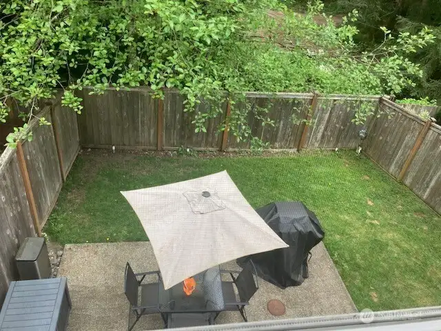 secluded back yard from upper level view!