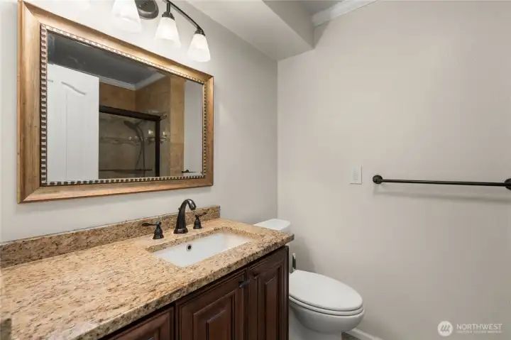 Main Bathroom, Granite Countertop, matches kitchen.