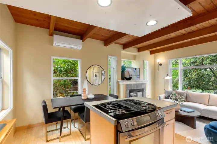 Gas cooking with space off to the side for prep and an area for guests to sit across from you.