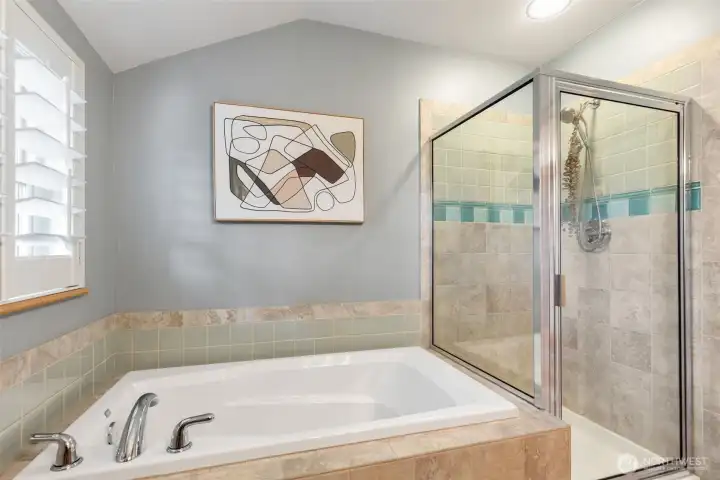 Upstairs bathroom with soaking tub and shower, not to mention a private window that looks out into the trees.