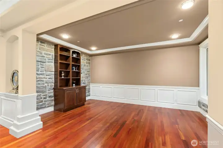Beautiful formal living room with custom built-in cabinets and shelving, highlighted by detailed millwork craftsmanship.