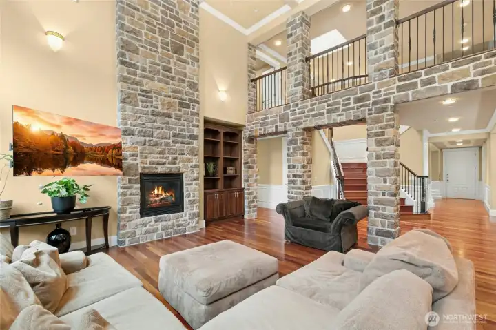 Upper-level railing overlooking the living room, enhancing the home’s open-concept design