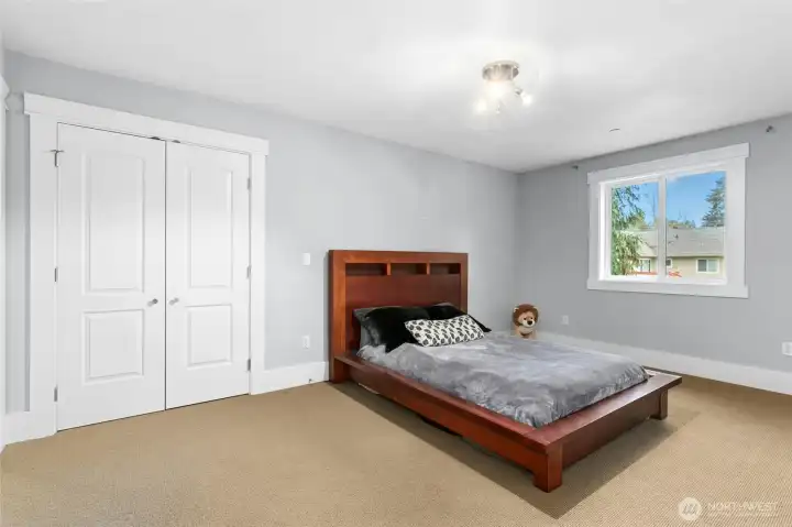 Well-appointed third bedroom offering its own en-suite bathroom for added privacy and convenience  En-suite bathroom serving the third bedroom, impeccably maintained and designed for privacy and   comfort.
