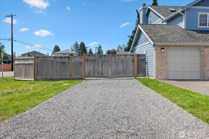 Fully fenced 1/3 acre with big gate for RV or boat access