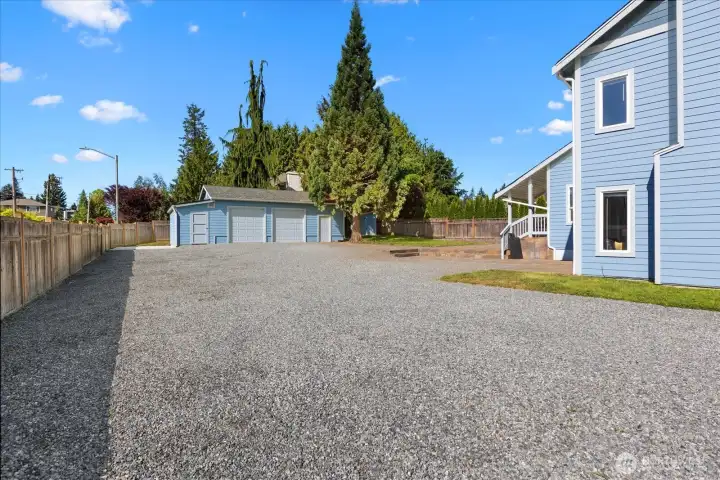 2 bay shop with boat pad on the left side