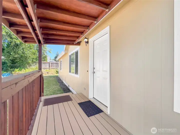 New covered front patio with trex decking, keeps you dry and your greeting guests or getting home from a long day New covered front patio with trex decking, keeps you dry and your greeting guests or getting home from a long day