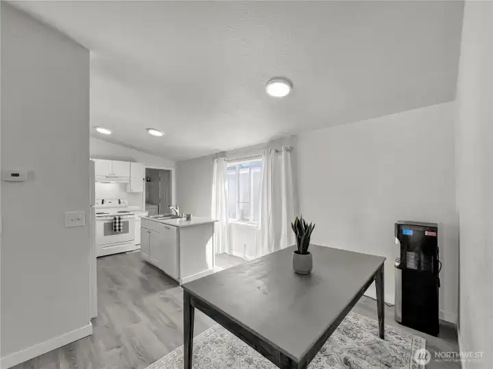 Dining room with large open window leads into this lovely updated kitchen Dining room with large open window leads into this lovely updated kitchen