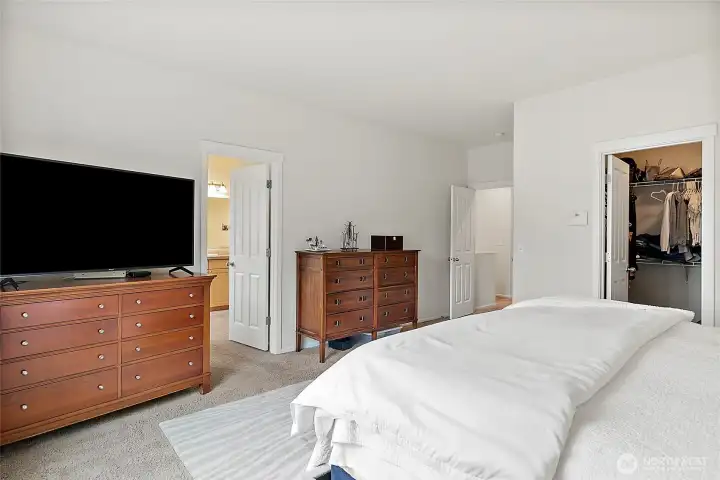 Primary bedroom with massive walk in closet Primary bedroom with massive walk in closet