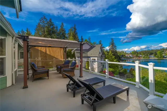 Step onto the spacious main level balcony and immerse yourself in luxury. The gazebo offers a charming retreat, perfect for enjoying the outdoors in comfort and style. With a gas connection for your grill, entertaining becomes effortless, allowing you to host memorable gatherings with ease.